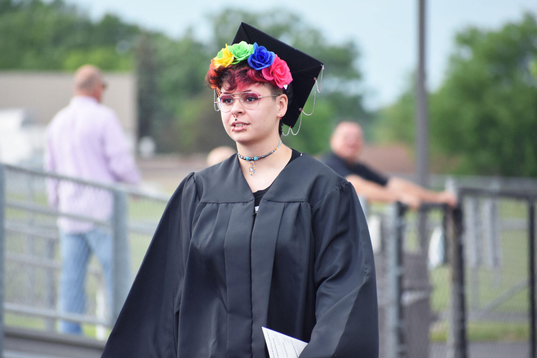 Graduate Kyah Schwantes makes a colorful entrance at Burlington High School ceremony